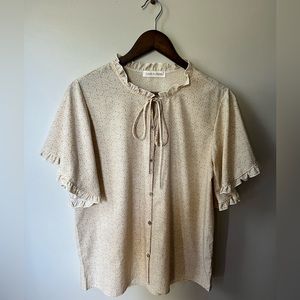 Lake Flower pale yellow/tan floral blouse with ruffle neckline and sleeve